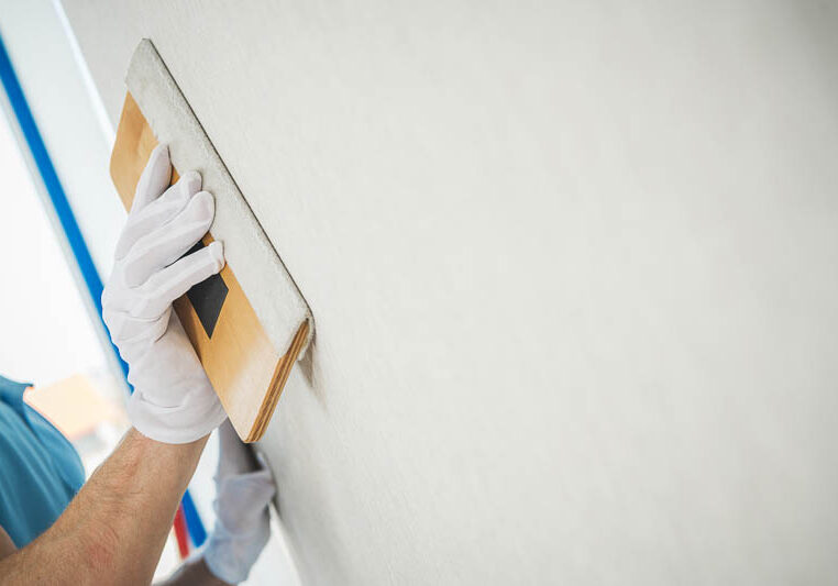 close-up-hand-holding-white-paper